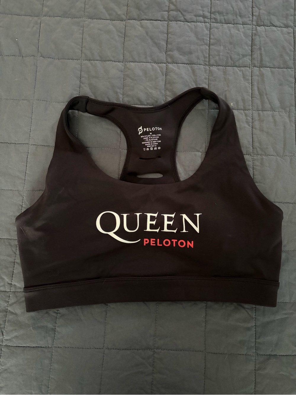 Peloton Black 'Queen' Racerback Sports Bra with White and Red Logo